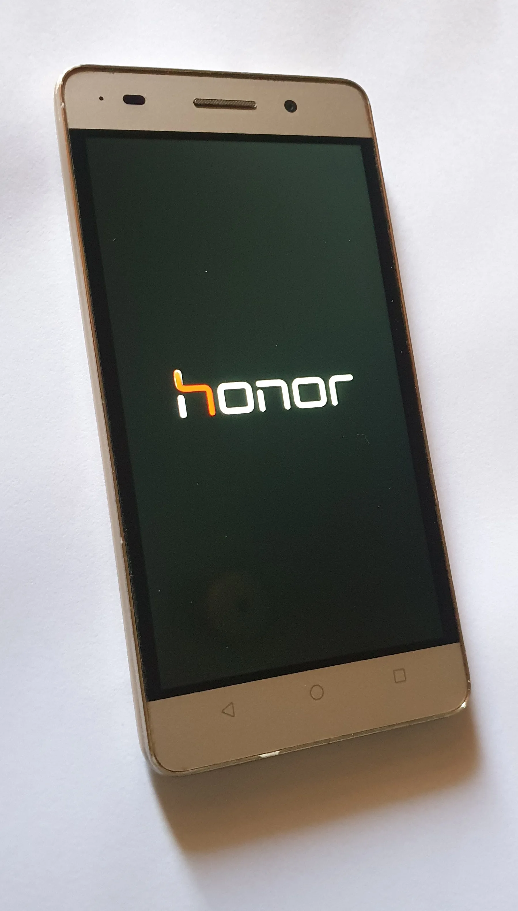 Huawei honor 4C (Golden) - photo 1