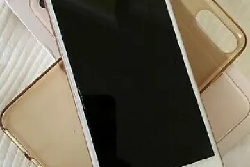 Apple iPhone 7 plus gold original factory unlock - Photos