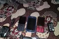 Mobiles not working for sale with free watches - Photos