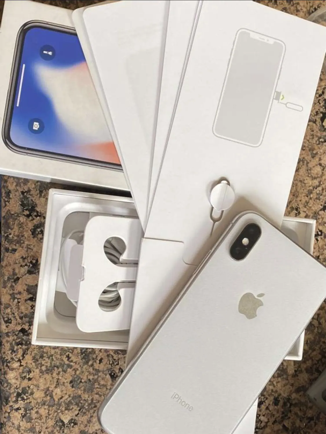 Iphone x 64gb in silver/white - photo 1