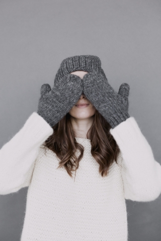 Woman hiding Her Eyes With Hands